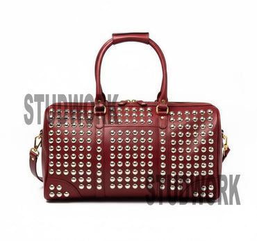 Crimson Vault Studded Leather Duffel Bag
